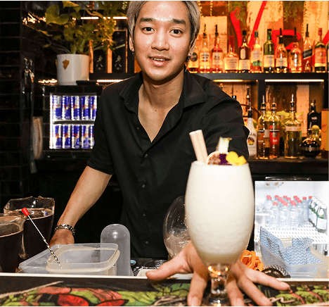 Bartender serving drink